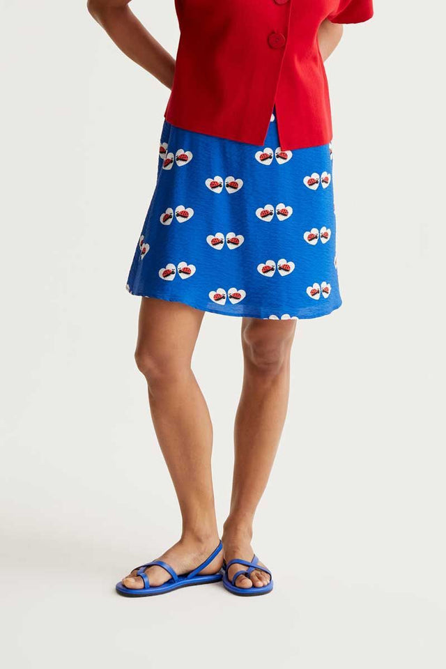 JUPE COURTE PETITE COCCINELLE