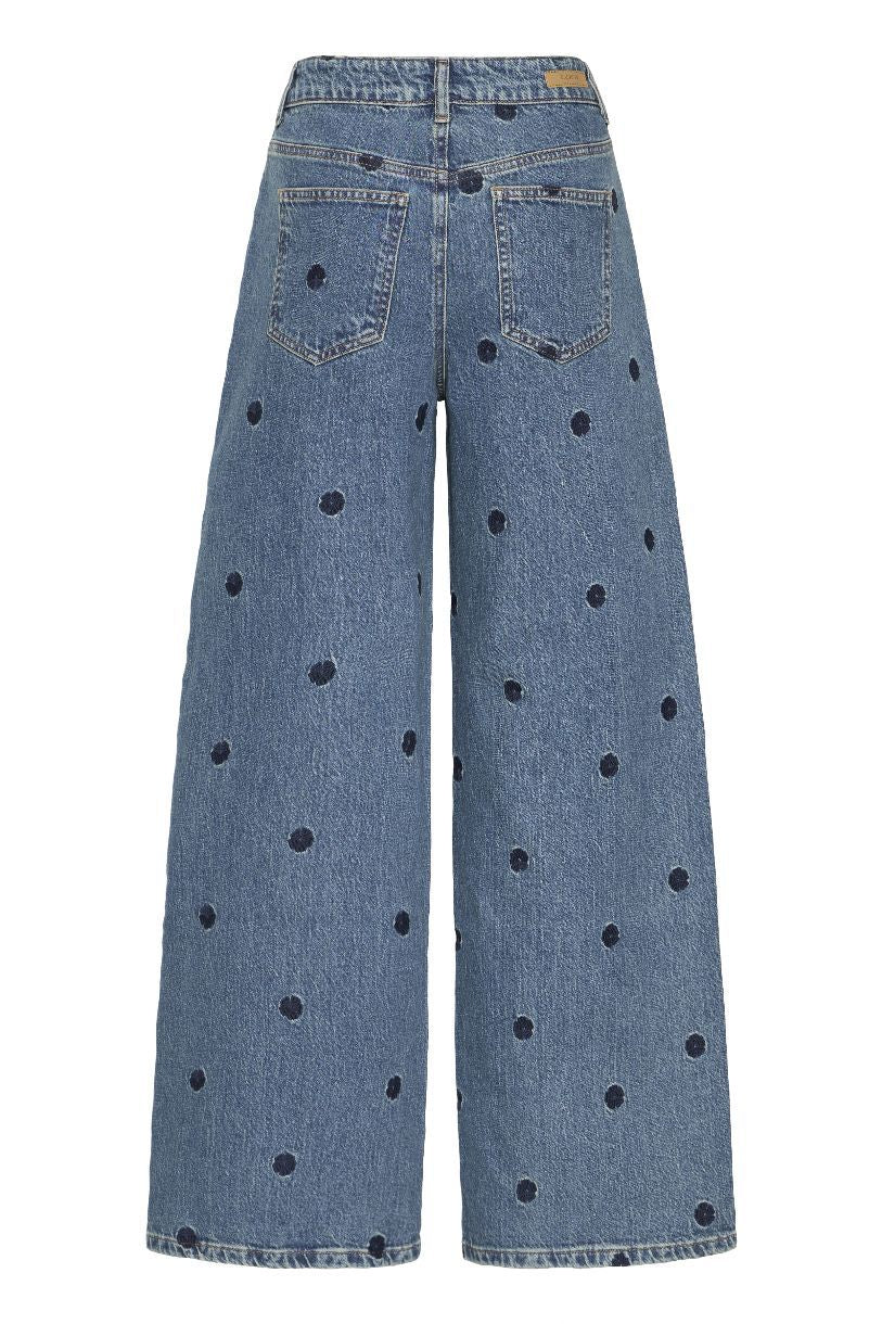 JEAN LARGE KENDA UNE FLEUR DISSIMULÉE