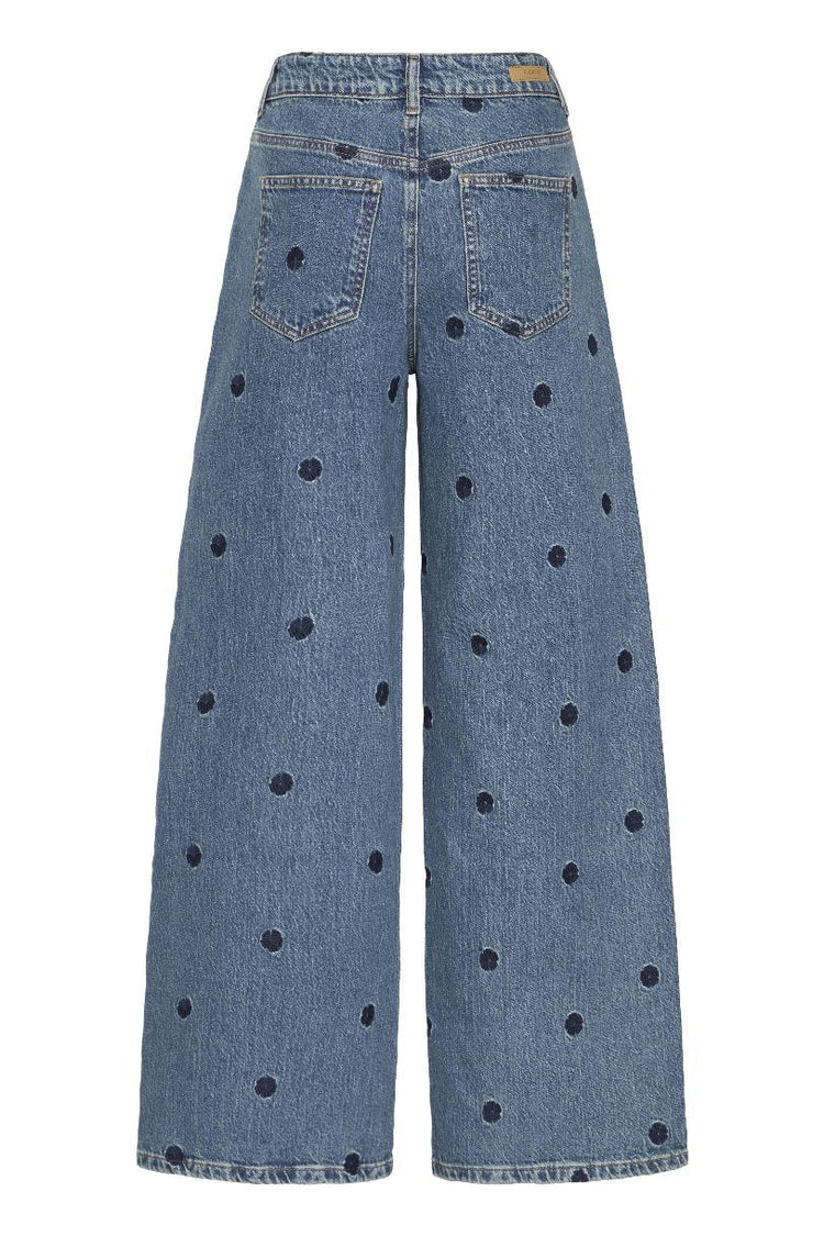 JEAN LARGE KENDA UNE FLEUR DISSIMULÉE