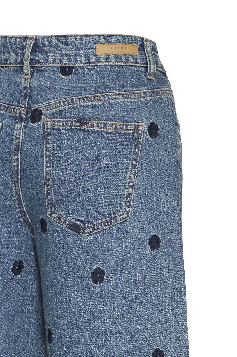 JEAN LARGE KENDA UNE FLEUR DISSIMULÉE