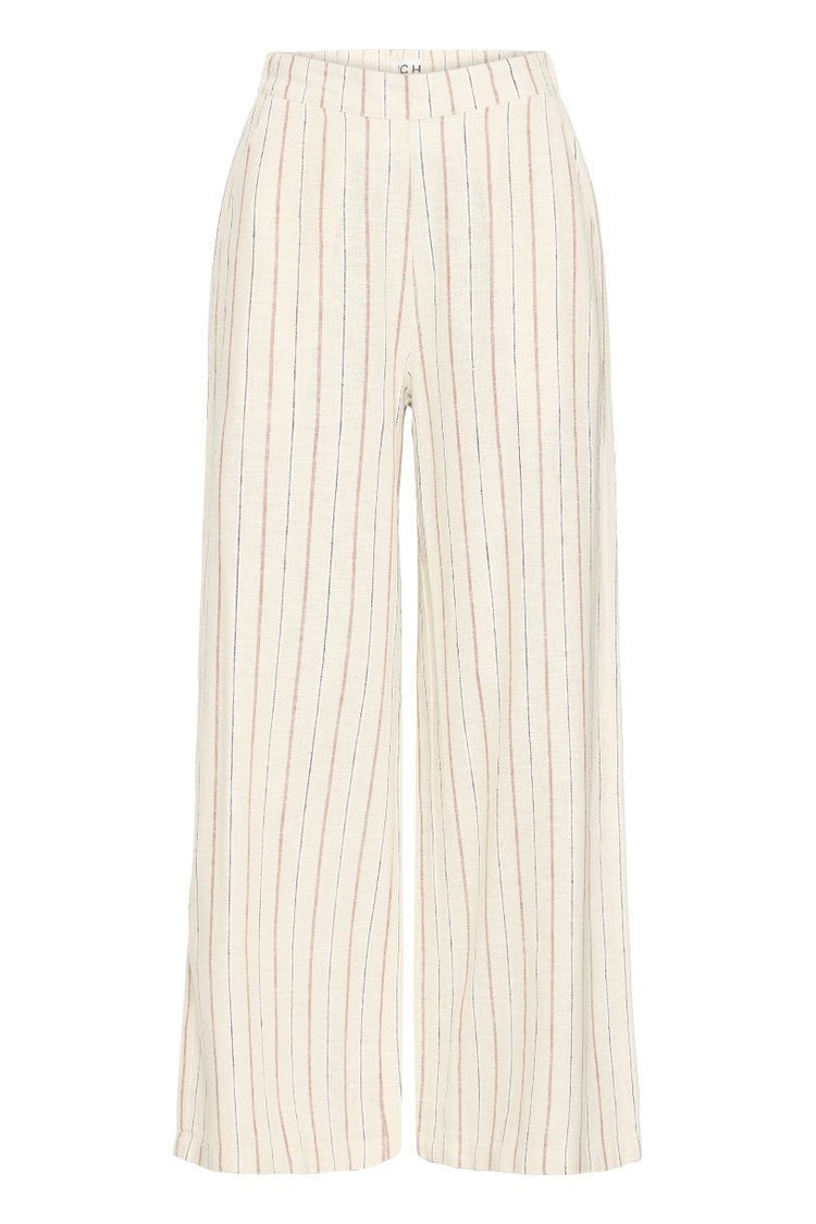 PANTALON LINNO PIEDS NUS SUR LA PLAGE