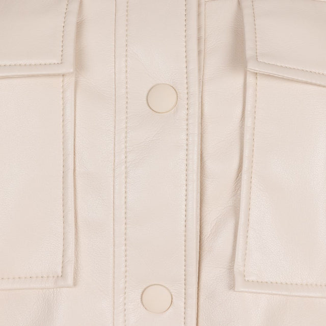 JACKET EN CUIRETTE SUR SON TRENTE-ET-UN