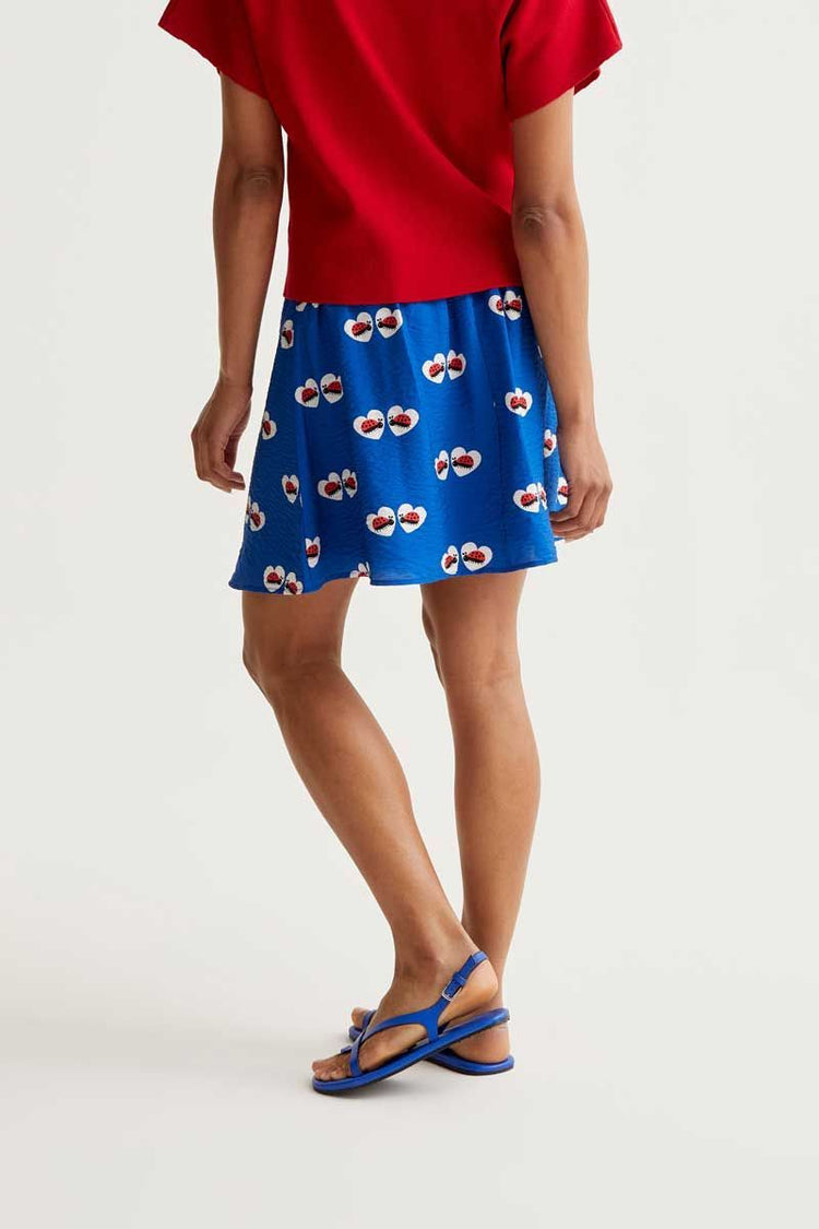 JUPE COURTE PETITE COCCINELLE