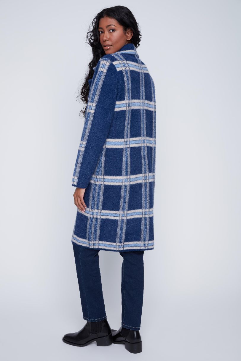 MANTEAU DES CARREAUX DANS LA NUIT