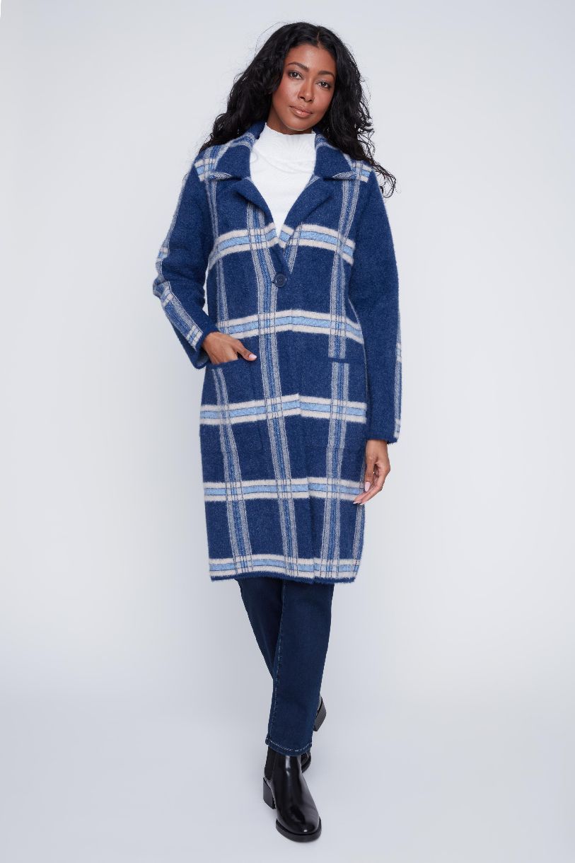 MANTEAU DES CARREAUX DANS LA NUIT